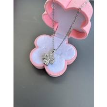 Gözde Aksesuarım Dönebilen Gümüş Renk Çiçek Kolyesi Çelik