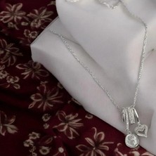 Rafiel Romantik Detaylar: Gül ve Kalp Detaylı Zirkon Taşlı Gümüş Çelik Kolye