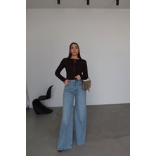 Özge Özgenç Dökümlü Kumaş Bol Paça Jean