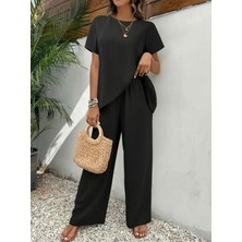 Kendim Fashion Kadın Kısa Kollu Bisiklet Yaka Asimetrik Kesim Detaylı Bürümcük Bluz ve Pantolon Ikili Takım