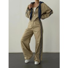 Şerit ve Bel Detaylı Bej Pantolon