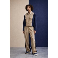 by Eylül Ertürk Bej Şerit Detaylı Saten Lacivert Pantolon