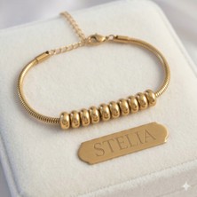 Çelik Gold - Altın Renk Oval Figürlü Bileklik