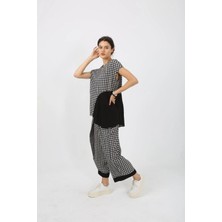 Des Concept Pötikare Desenli Asimetrik Kesim Bisiklet Yaka Bluz