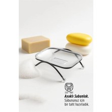Aesco Mey Ithalat® Ayaklı Sabunluk – Su Giderli, Şeffaf Tasarım, 12 x 9 Cm, Tezgah Üstü Kullanım