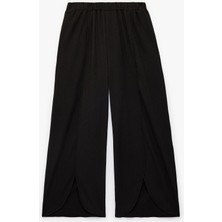 Koton Kız Çocuk Beli Lastikli Geniş Paça Pantolon Dokulu Tasarım Polyester Karışımlı