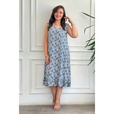 Yağmur Butik V Yaka Kolsuz Biyeli Etek Ucu Fırfırlı Viscon Elbise Trend Kloş Silüet Çiçekli Desen