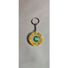 Miina Aksesuar altın varak detaylı el yapımı dekoratif bir görünüm sunan epoksi reçine anahtarlıktır.