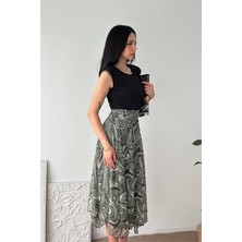 Neşeli Butik Kadın Yeşil Modern Kesim Vatkalı Asimetrik Kesim Mermer Desen Elbise NBK4593