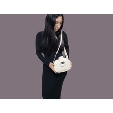 Dilorans Stilinizi Konuşturun: Şık Metal Kilitli Baget Çanta