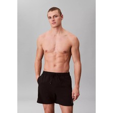Calvin Klein Erkek Normal Kesim Beli Lastikli ve Ip Bağlamalı Hızlı Kuruyan Siyah Deniz Şortu LV00N61037-UB1
