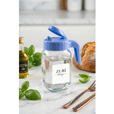 Zuri Design Cam Sürahi Kapaklı ve Akıtma Uçlu Kulplu Şeffaf Cam Sürahi Mavi 850 cc