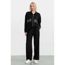 Selen Yanları Aksesuarlı Bol Paça Örme Pantolon  /  Siyah