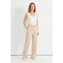 Selen Beli Lastikli Kendinden Plise Pantolon  /  Bej
