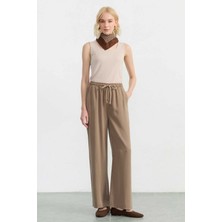 Selen Beli Lastikli Yandan Cep Bol Paça Dökümlü Pantolon  /  Vizon