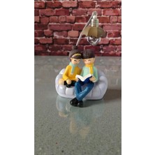 Famemus Accessory Oturan Çift Hediyelik Ürün Biblo Ürün Boyutu: 20CM*13CM