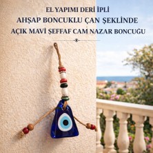 El Yapımı Deri Ipli Ahşap Boncuklu Çan Şeklinde Açık Mavi Şeffaf Cam Nazar Boncuğu