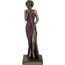 Es Dekor Ürün Isim:    Kadın Şarkıcı Ebat:    10*10*31 cm Cazcı