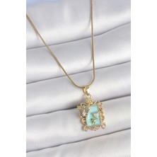 Bluefeet 316L Çelik Gold Renk Zincir Mavi Mineli Çiçek Işlemeli Zirkon Taşlı Kelebek Detay Portre Model Kadın Kolye