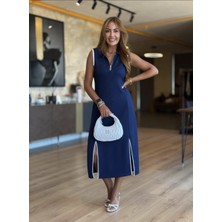 Qimya Butik Şans Life Kadın Fermuarlı Polo Yaka Biyeli Çift Yırtmaçlı Midi Boy Kolsuz Örme Elbise