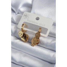 Uravas Store 316L Çelik Gold Renk Sallantı Kuru Kafa Model Kadın Küpe