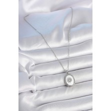 Youday Accessories 316L Çelik Gümüş Renk Beyaz Mineli Güneş Işlemeli Nazar Boncuk Detay Madalyon Model Kadın Kolye