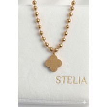 Stelia Top Zincirli Gold Renk İşlemeli Yonca Model Kolye