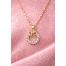 Sylvera Shop Fiyonk Detaylı Işıltılı Çelik Kolye (Gold Renk)