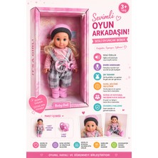 Şapkalı Sesli Oyuncak Bebek – Emzik Aksesuarlı Kız Çocuk Oyuncağı