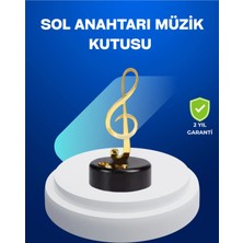 Sayarmarkt Sol Anahtarı Figürlü Dönen Müzik Kutusu Altın Renk Dekoratif