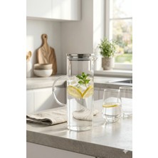 Homerest 1200 ml Borosilikat Isıya Dayanıklı Cam Sürahi Metal Kapaklı Modern Su Karafı 23 cm x 9 cm