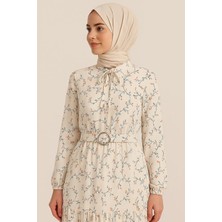 Tomris Butik Çiçek Desenli, Kemerli ve Kloş Kesimli Tesettür Elbise