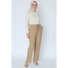 Hadiora Kadın Bej Beli Lastikli Bağcıklı Atlas Bol Paça Pantolon