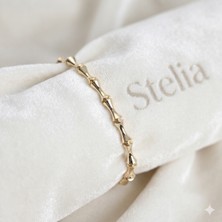 Stelia Pirinç Altın Renk Kaplama Kemik Model Zirkon Taşlı Kadın Bileklik