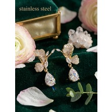 Stainless Steel Pirinç Gold Renk Zirkon Taşlı Turna Kuşu Sallantılı Model Küpe