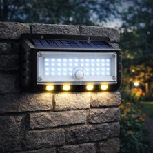 Al-Kar Ticaret Panter Solar Hareket Sensörlü LED Duvar Lambası 3W 44 Smd Beyaz + 4 Gün Işığı Led, 300 Lümen, IP65 Su Geçirmez, 3 Modlu Güneş Enerjili Aplik, Balkon ve Bahçe Aydınlatması
