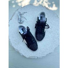 Golden Goose Luxury Siyah Simli Kadın Sneaker - Beyaz Yıldız Detaylı Spor Ayakkabı