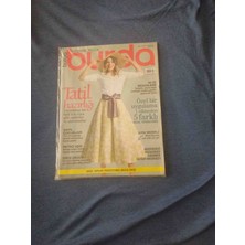 Burda Dergi Temmuz  2018/7.         Tatil Hazırlığı, Plaj Giysileri, Retro Kesimler ve Dikiş Teknikleri Hakkında Bilgiler Içerir.