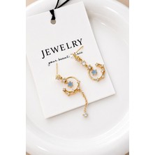 Trend Collection Gold Renk Taşlı Sallantılı Kadın Küpe Zarif Tasarım