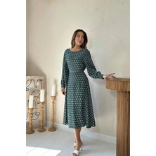Caddebostan Moda Bisiklet Yaka Uzun Kollu Belden Bağlamalı Desenli Midi Elbise