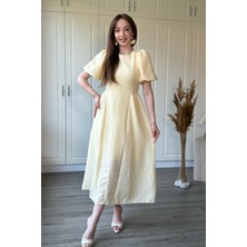 Dilay Gökoğlu Butik Sarı Müslin Kumaş Balon Kol Midi Elbise