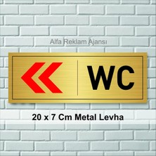 Wc Yazılı Sol Tarafa Ok Işareti Gösteren Metal Levha