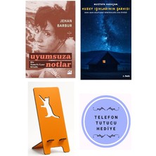 Doğan Kitap Uyumsuza Notlar-Bir Tomris Uyar Kitabı - Jehan Barbur + Kuzey Işıklarının Şarkısı + Telefon Tutucu