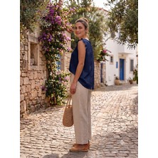 Meltem Collection Sırtı Düğme Detaylı Kolları Fırfırlı Müslin Bluz