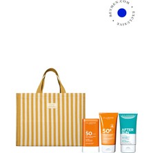 Clarins Yüz ve Vücut SPF50+ Güneş Kremi + Güneş Sonrası Balsamı + Plaj Çantası Seti