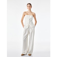 Koton Slim Fit Cep Detaylı Düğmeli Peplum Kesim Straplez Yelek Bluz