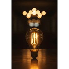 CATEKSSS A6 LED Filament Ampul 6W 2700K Amber Cam – Sarı Işık – 600 Lümen