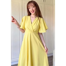 Dilay Gökoğlu Butik Kruvaze Yaka Kolları Volanlı Midi Sarı Elbise