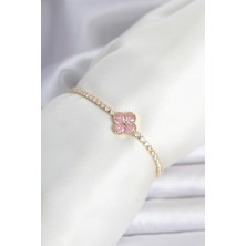 Clariss Pirinç Gold Renk Pembe Zirkon Taşlı Yonca Model Su Yolu Kadın Bileklik