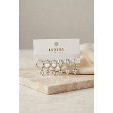 Clariss Kalp Zirkon Taşlı Gümüş Renk Pirinç Set Küpe